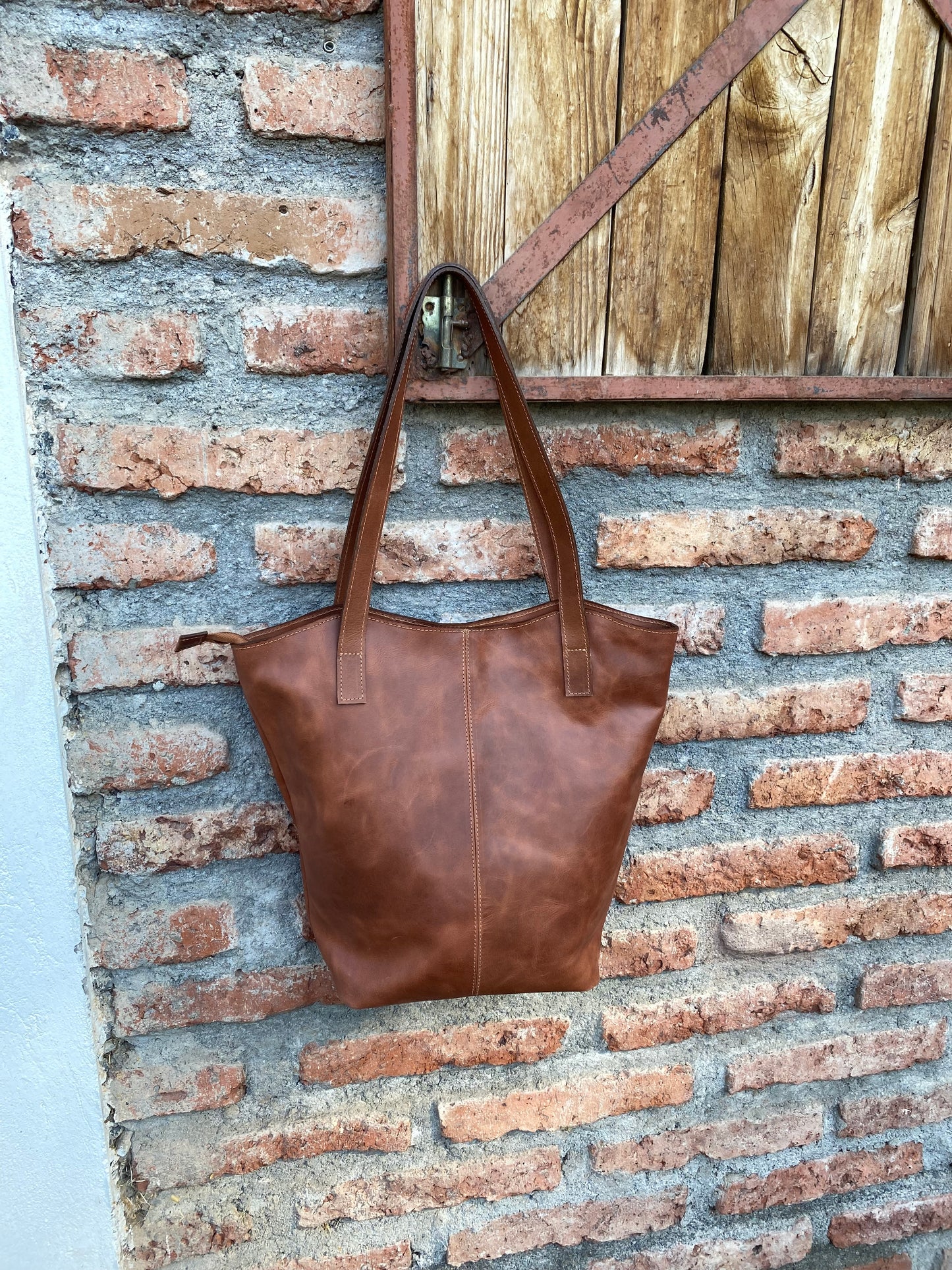 Cartera Julia cuero Castaño.