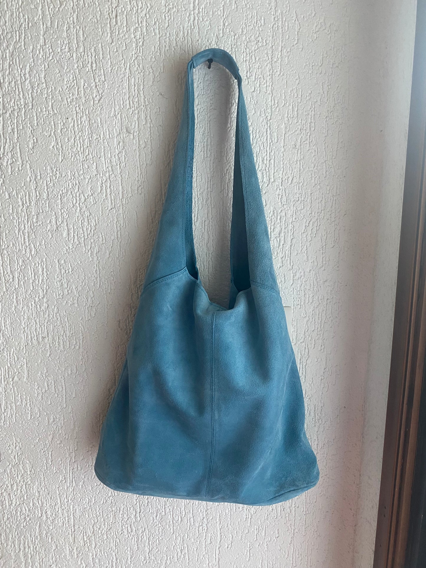 Cartera Renate, reno celeste.